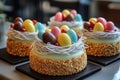 Delicious mini cheesecakes decorated with easter eggs nests and chocolate for spring celebration Royalty Free Stock Photo