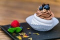 Delicious mini Pavlova meringue cake decorated with fresh blueberry and rasberry. Royalty Free Stock Photo