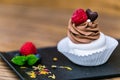 Delicious mini Pavlova meringue cake decorated with fresh blueberry and rasberry