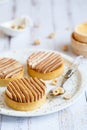 Delicious mini tarts with nuts and custard. Assortment of delicious and colorful dessert, salted caramel tart, lemon curd tart