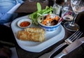 mixed dish of fried spring roll, serve with salad