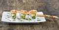 Delicious mixed sushi arranged on white marble surface Royalty Free Stock Photo