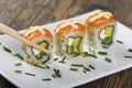 Delicious mixed sushi arranged on white marble surface Royalty Free Stock Photo