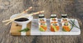 Delicious mixed sushi arranged on white marble surface Royalty Free Stock Photo