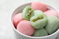 Delicious mochi in bowl on table, closeup. Traditional Japanese dessert