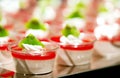 Delicious mousse and jelly with cream and kiwi toping