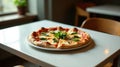 A delicious mozzarella pizza with fresh basil, served on a white plate, sits on a clean white table in a modern restaurant setting Royalty Free Stock Photo