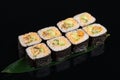 Delicious mussel sushi roll set on banana leaf