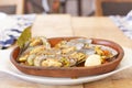 Delicious mussels casserole on wood Royalty Free Stock Photo