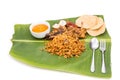 Delicious nasi briyani meal with mutton, dhal on banana leaf Royalty Free Stock Photo