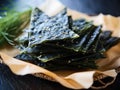 Delicious natural organic seaweed nori snack chips, roasted seasoned crispy sheets of seaweed.