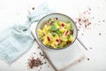Delicious new potato salad with red onion, capers, greens in a bowl Royalty Free Stock Photo