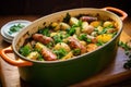 A delicious and nutritious casserole dish filled with a medley of potatoes and fresh vegetables, Irish Coddle with sausage