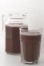 Chocolate jar and glass Royalty Free Stock Photo