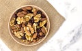 Delicious nuts arrangement in a wooden bowl Royalty Free Stock Photo