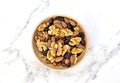 Delicious nuts arrangement in a wooden bowl Royalty Free Stock Photo