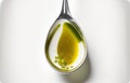 Delicious olive oil spoon on a white backdrop Royalty Free Stock Photo