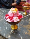 Delicious pakistani strawberry icecream in golden cup in quetta, pakistan