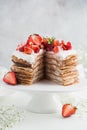 Delicious pancake cake with cottage cheese and strawberry