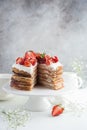 Delicious pancake cake with cottage cheese and strawberry