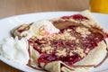 Delicious pancake with chocolate, raspberry, ice cream and whip Royalty Free Stock Photo