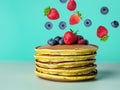 delicious pancakes on a blue background