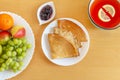 Delicious pancakes, crepes, plate of fruits and citrus gelo