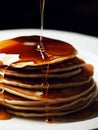 Delicious pancakes on plate with maple syrup Royalty Free Stock Photo