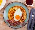 Delicious pancakes with scrambled eggs and bacon Royalty Free Stock Photo