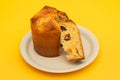 Delicious Panettone slice with candied fruits on dish