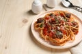 Delicious pasta with meatballs and tomato sauce served on wooden table. Space for text Royalty Free Stock Photo