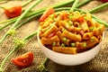 Delicious pasta penne with herbs served in bowl. Royalty Free Stock Photo