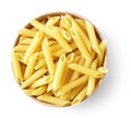 Penne pasta or macaroni in a wooden bowl Royalty Free Stock Photo