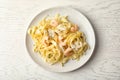 Delicious pasta with shrimps on white table, top view Royalty Free Stock Photo