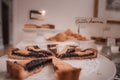 Delicious Pastries and Charming Sign on Table in Venetian Hotel - Summer Collection