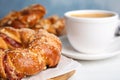 Delicious pastries and coffee on table