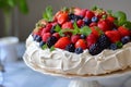 Delicious Pavlova cake with fresh strawberry and blueberry