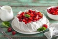 Delicious Pavlova cake with fresh strawberry