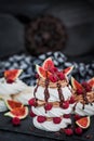 Delicious Pavlova meringue cakes decorated with chocolate cream Royalty Free Stock Photo