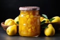 Delicious pear jam in a glass jar, surrounded by juicy organic fruits