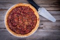 delicious pecan pie high angle view on wood table