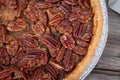 delicious pecan pie high angle view on wood table