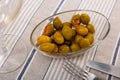 Delicious pickled green olives with cucumber, spanish dish - Olivas verdes y pepinos