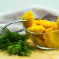 Delicious pickled mini-zucchini, cooked at home on the kitchen table. Preserves.