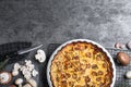 Delicious pie with mushrooms and cheese served on dark grey table, flat lay. Space for text Royalty Free Stock Photo