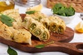 Delicious pie with spinach and feta cheese, made from filo pastry, decorated with sesame seeds Royalty Free Stock Photo