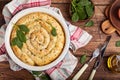 Delicious pie with spinach and feta cheese, made from filo pastry, decorated with sesame seeds Royalty Free Stock Photo