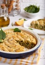 Delicious pie with spinach and feta cheese, made from filo pastry, decorated with sesame seeds Royalty Free Stock Photo