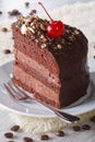 Delicious piece of dark chocolate cake with cherry Royalty Free Stock Photo