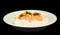 Delicious piece of salmon on a bed of long grained rice Royalty Free Stock Photo